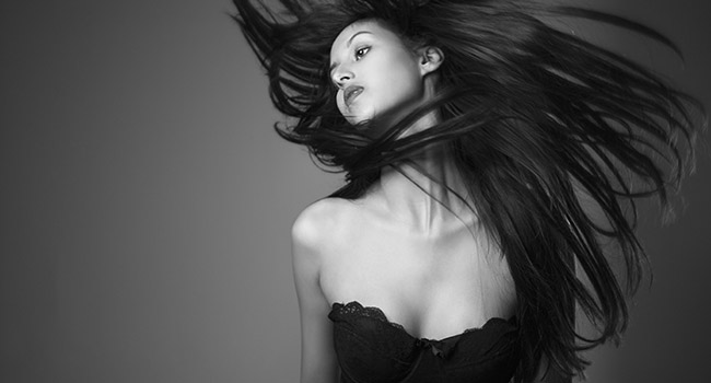 Woman flinging long hair